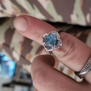 Galatea Kaleidescape blue topaz with emerald and ruby.